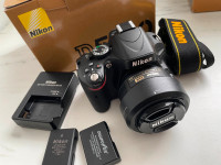 Nikon D5100 with 35mm 1.8 Lens and Battery Grip