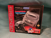 Sega genesis complet avec boite, jeu sonic , livrets ect