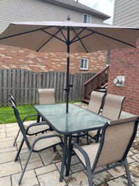 Patio dining set (table and six chairs, plus umbrella)
