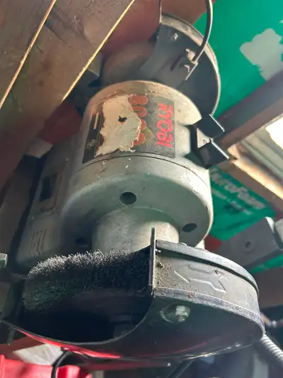 8” Ryobi double sided 110 volt grinder. Stone on one side brush on other side Located Colborne, Onta...
