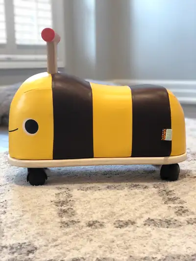 B. Toys Wooden Bee Ride-On, View more