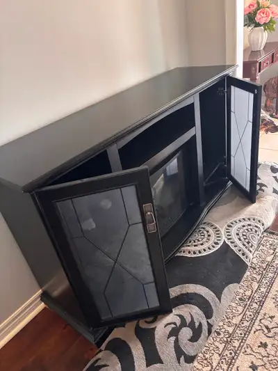 Fireplace unit tv stand from Home Depot chocolate brown for sale, View more