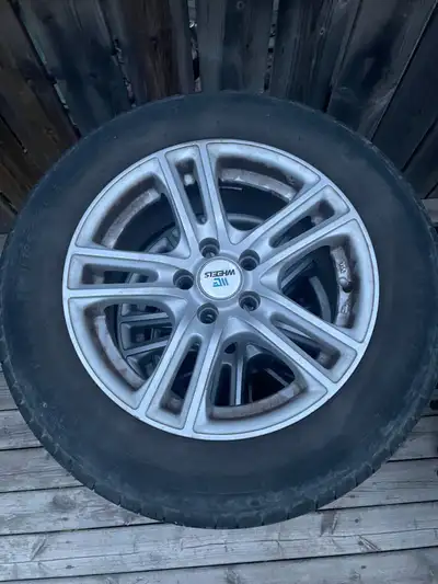 Aftermarket wheels from costco 15x6.5 5x100 bolt pattern Comes with all seasons tires 195/65r15 2 ar...
