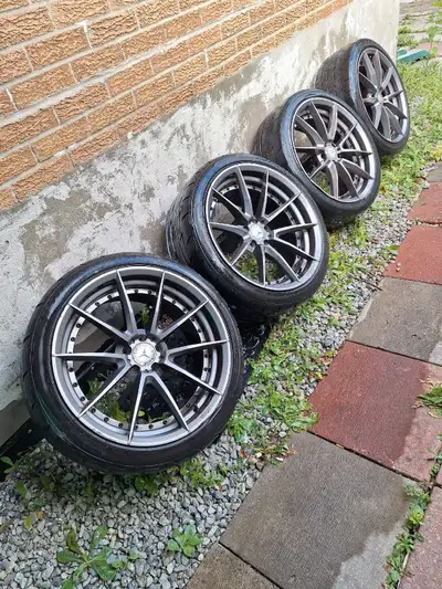 Selling a set of 4 x 20-inch Niche M197 Sector rims in Gloss Anthracite finish, wrapped in Firestone...