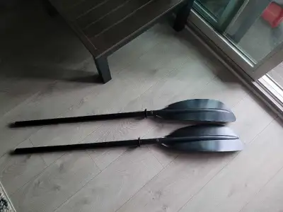 Get ready to paddle into adventure with this pair of used Pelican kayak paddles! These paddles are p...