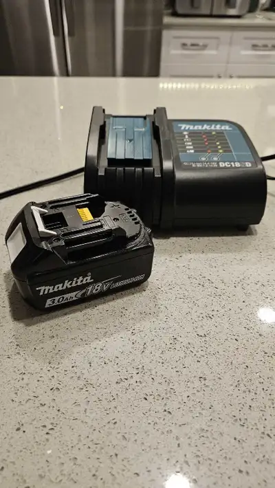 Makita 3.0 Ah battery and charger, View more