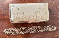 Formal clutch purse - gold in colour with detachable chain strap