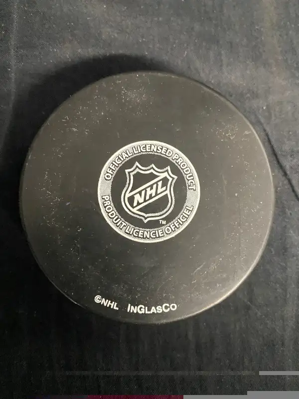 Jonathan Huberdeau Autographed Puck64192110001538121