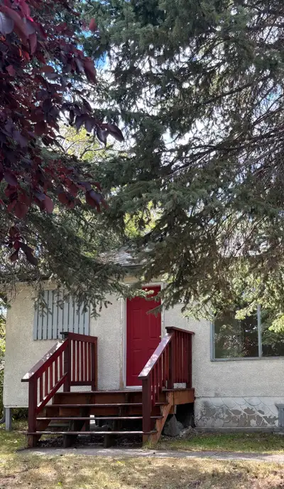 2 bedroom and den with full unfinished basement/1 bathroom Close to Spruceland Mall Covered parking...