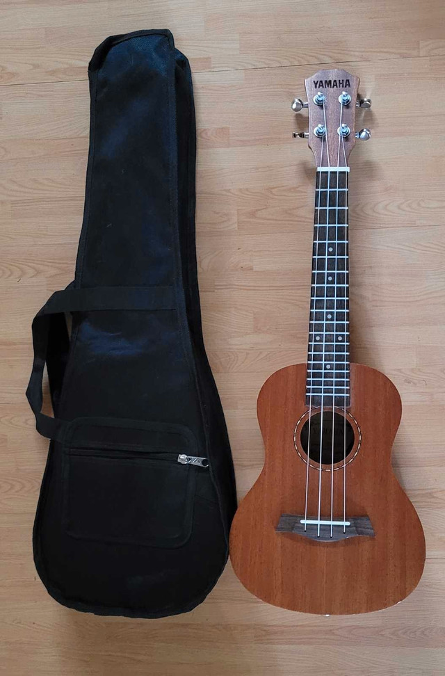 Yamaha 4 String Ukulele with Carrying Case. Model  - Y-UK- 24 in Guitars in Oshawa / Durham Region
