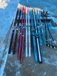 3 pairs cross country ski’s and poles