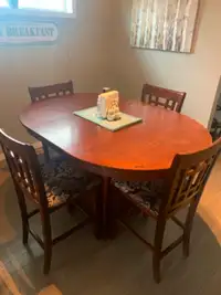 Dinning room table, chairs and hutch