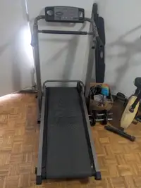 Universal Fitness Treadmill Manual...