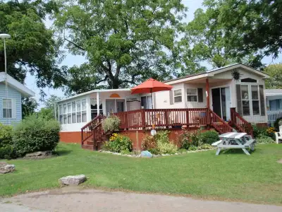 Large waterfront Cottage with lots of updates. One of the most beautiful lots in park. Before you sp...