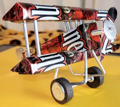 Model plane from a popular beer in Cuba, this Bi-Plane is not a model kit. Fully hand made from wood...