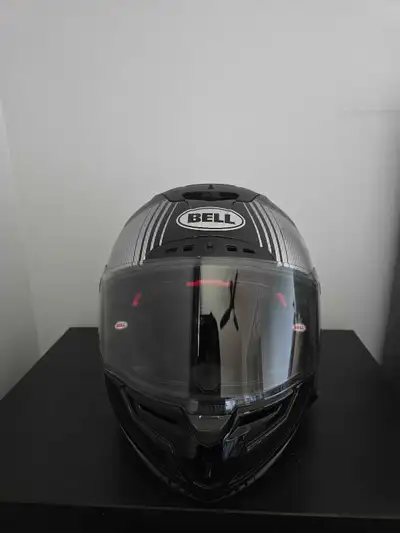 Used Bell Star Flex helmet. Manufacture date is 2016. Comes with bag. Transition visor is on the hel...