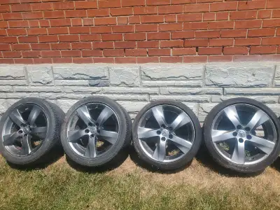 These are the 2011 Lexus IS250c rims and tires, complete with a rim guard edge, ready to give your r...