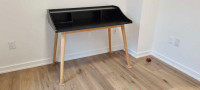 Black wooden writing desk