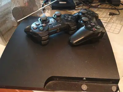 Selling a Sony PlayStation 3 console with 4 Dualshock 3 controllers. The console is in used conditio...