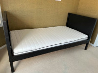 IKEA bunkbed convertible to  single beds, mattresses included.