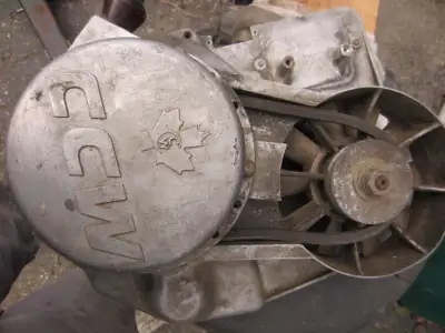 FOR SALE CCW snowmobile engine recoil and axle fan good shape and works well