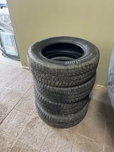 New Bridgestone Blizzak winter tires with 300km on them. Came off 2015 Honda CRV but will fit many d...