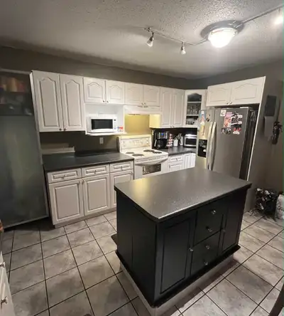 entire kitchen with stove., View more