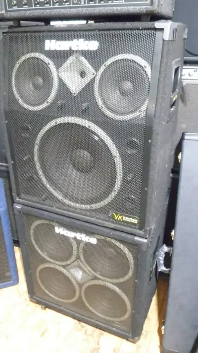 Hartke VX Series Bass cabs stack. - Top is 1- 15" speaker and 2- 8" and a horn. - Bottom is 4- 10" a...