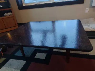 I bought a small used coffee table when I first moved to Whitehorse, and screwed a bigger hand made...