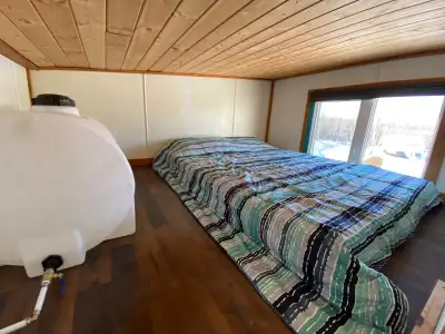 Dry tiny house for rent in Ibex Valley 30 minutes from town. The loft where the bedrooms are, is hig...