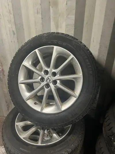 17” OEM Lexus UX rims with 225-55-17 Michelin Xice snow winter tires. In good condition. Tires have...