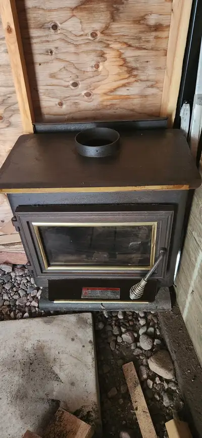 I have a Brick Lined Wood Stove used less than one year. Been stored in shed for many years. No brok...