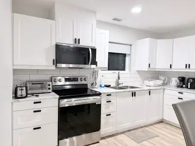 Private 1BR Suite | Kitchen, Laundry & Parking, View more