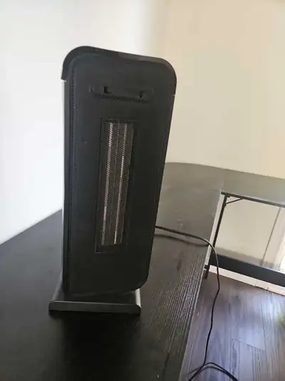 Selling a black portable ceramic tower space heater. Works well and heats up quickly. Good for bedro...