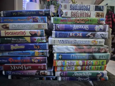 VHS lot 38 assorted VHS without cases. Some for adults. Some for kids. All the classics. Selling as...