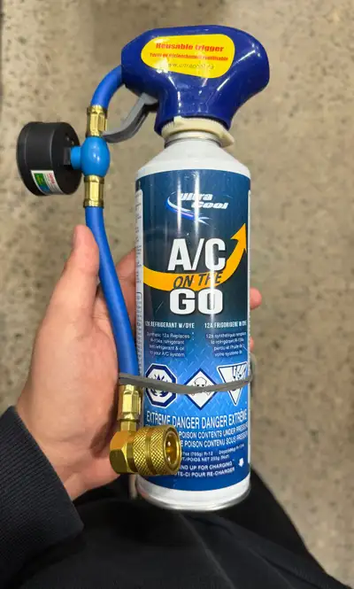 Refuel your car's A/C with this Ultra Cool A/C On The Go AC Refuel kit, designed for ease of use and...
