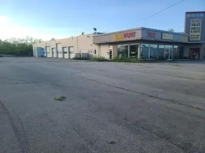 This spacious automotive facility is available for lease, offering a prime location for sales, servi...