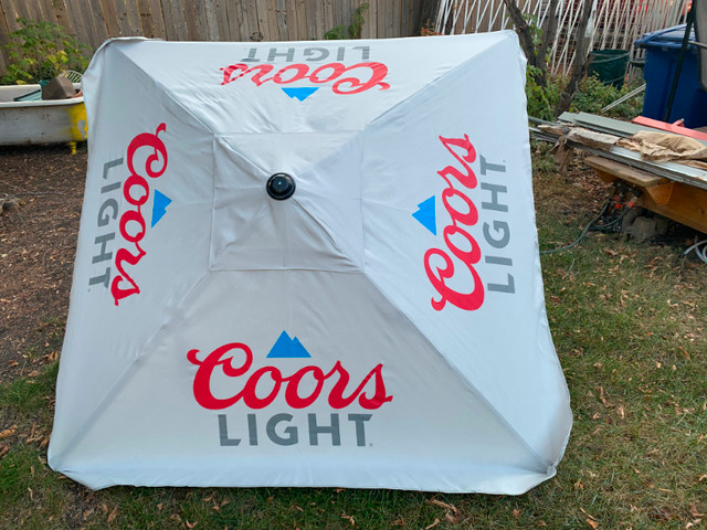 Brand new Coors Lite umbrella in Patio & Garden Furniture in Saskatoon