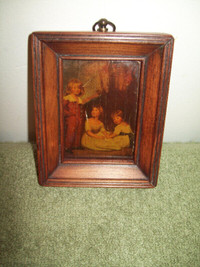 Picture of children in antique wood frame
