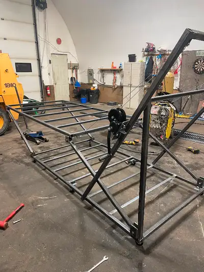 Double stacking snowmobile lift that can also be used as a work lift. Custom built to your needs. Fo...