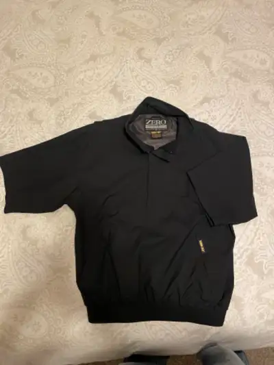 • Highly sought after “Zero Restriction” Brand of Golf Outerwear • Size Medium • Color Black • All s...