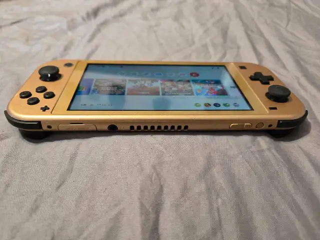 Gold Nintendo Switch Lite Zelda Edition in Nintendo Switch in Edmonton - Image 5