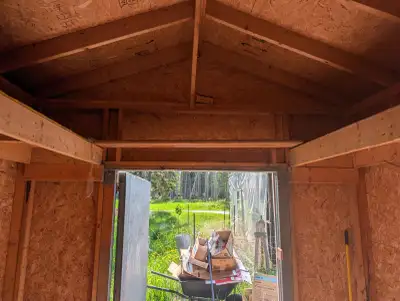 12 ft by 10 ft. 2. In tin roof shed large enough to be a bunkhouse built on skids solid hardwood flo...