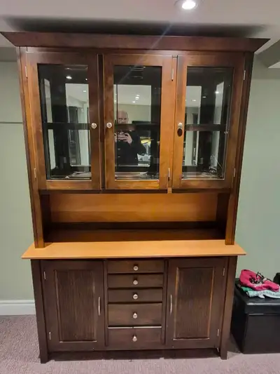 This is a handsome china cabinet, perfect for displaying your best dinnerware or collectables, and i...