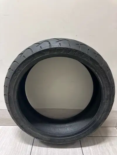 Older tire that was removed when wheels were refinished and stored in climate controlled garage. Lot...