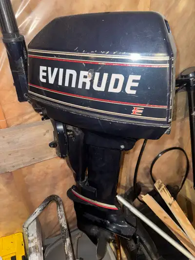 8hp evin rude very clean and runs, stored inside offer