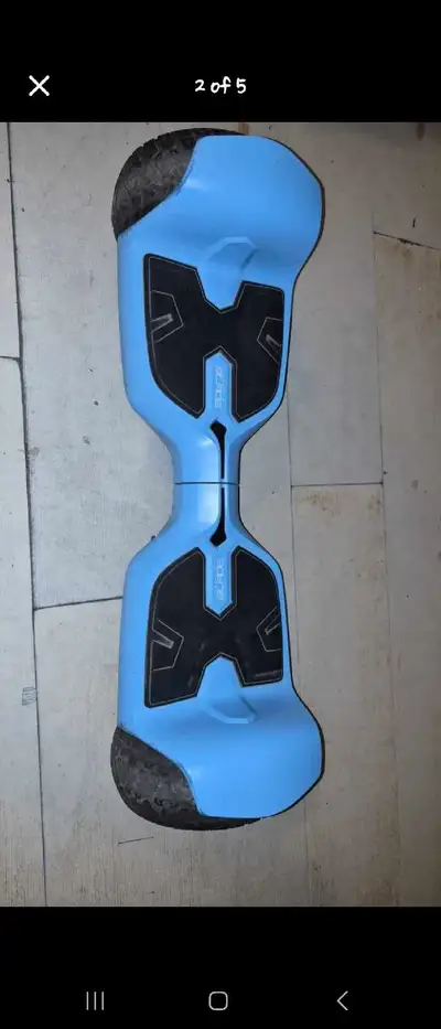 (PRICE CAN BE NAGOTIBALE) Outdoor/indoor Gravity blade hoverboard in pretty good condition with some...