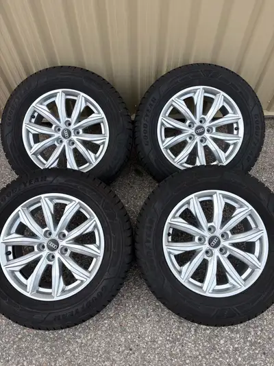 EXCELLENT CONDITION 4 x 235/65/17 GOODYEAR ULTRAGRIP WINTER TIRES MADE IN GERMANY AND OEM AUDI RIMS...
