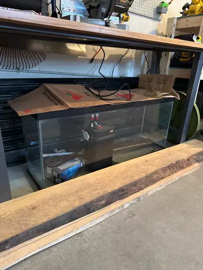 Selling my old 55 gallon aquarium with the Fluval 306 cannister filter. Thought I’d get back in to t...