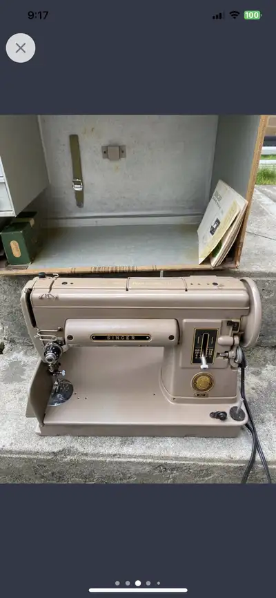 This vintage Singer sewing machine is a piece of history ready to sew its way into your heart! It's...
